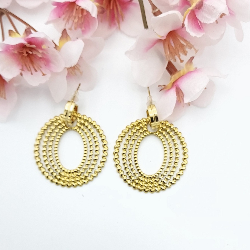 BOUCLES D'OREILLES FRISEES